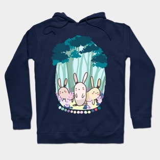 Three cute bunnies in the forest Hoodie